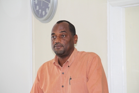 Permanent Secretary in the Ministry of Agriculture Fisheries and Cooperatives in the Nevis Island Administration Dr. Kelvin Daly delivering remarks at the one day Marine Protection Awareness Workshop at the Nevis Cooperative Conference Room in Charlestown on October 31, 2012